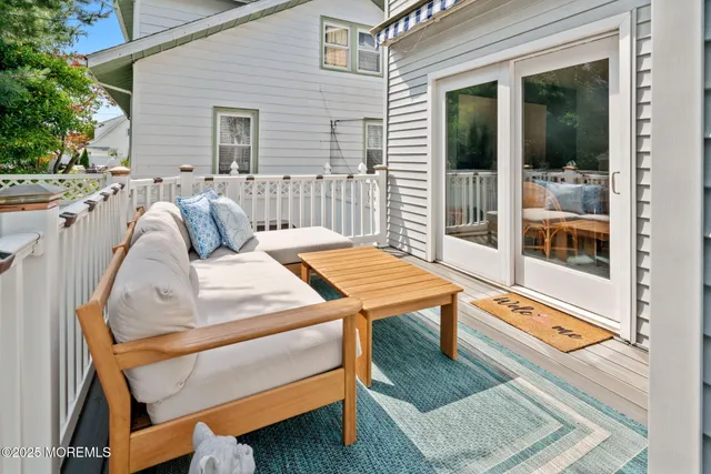 a view of a balcony with door