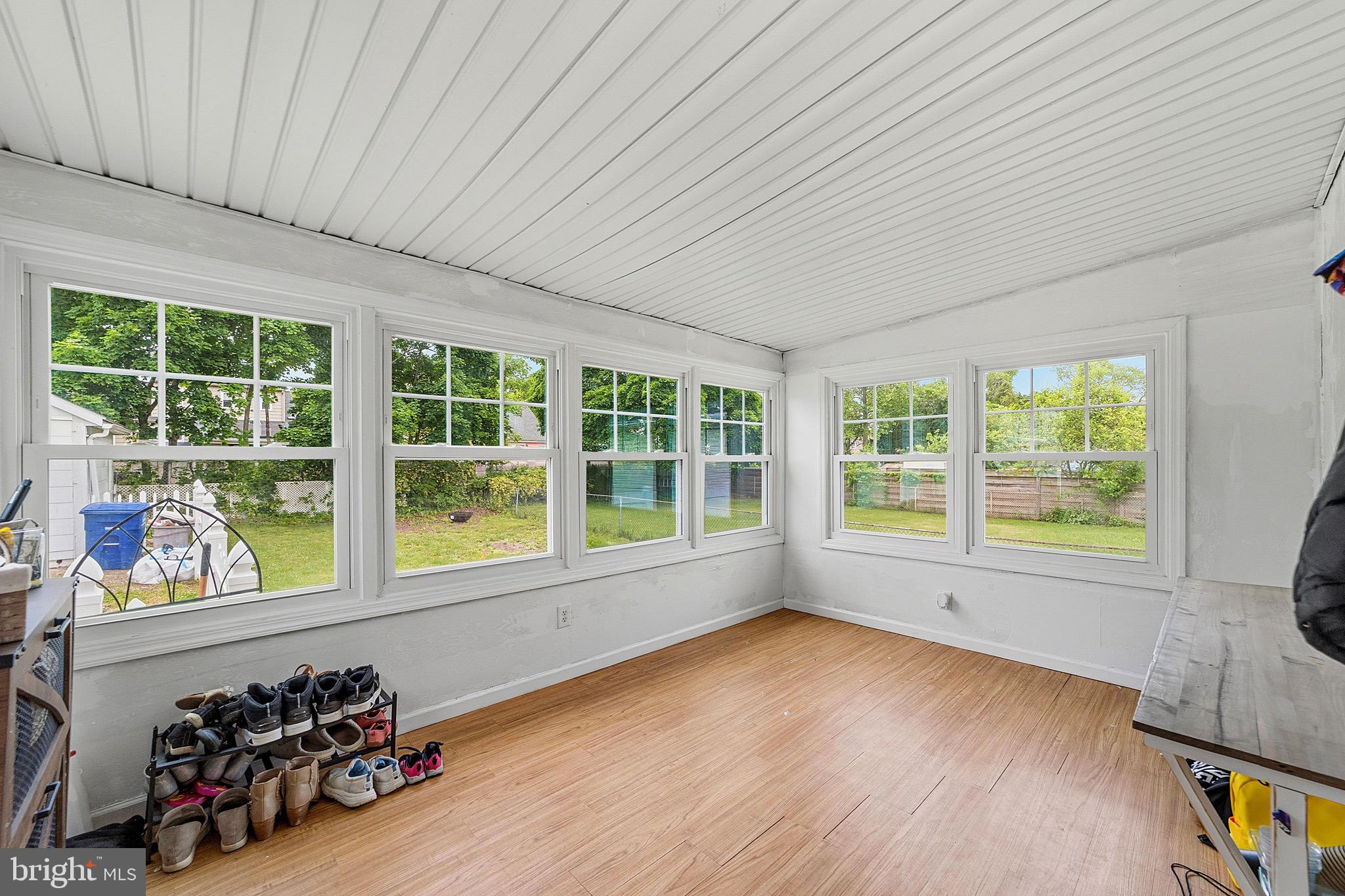 15 South Clinton Avenue Maple Shade, NJ 08052 - Photo 21 of 29 a view of a room with wooden floor and windows