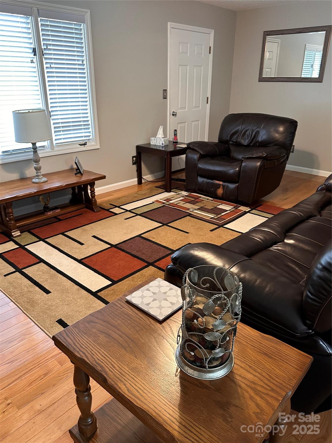 450 Case Cove Road, Unit 85 Candler, NC 28715 - Photo 7 of 14 a living room with hard wood flooring and furniture