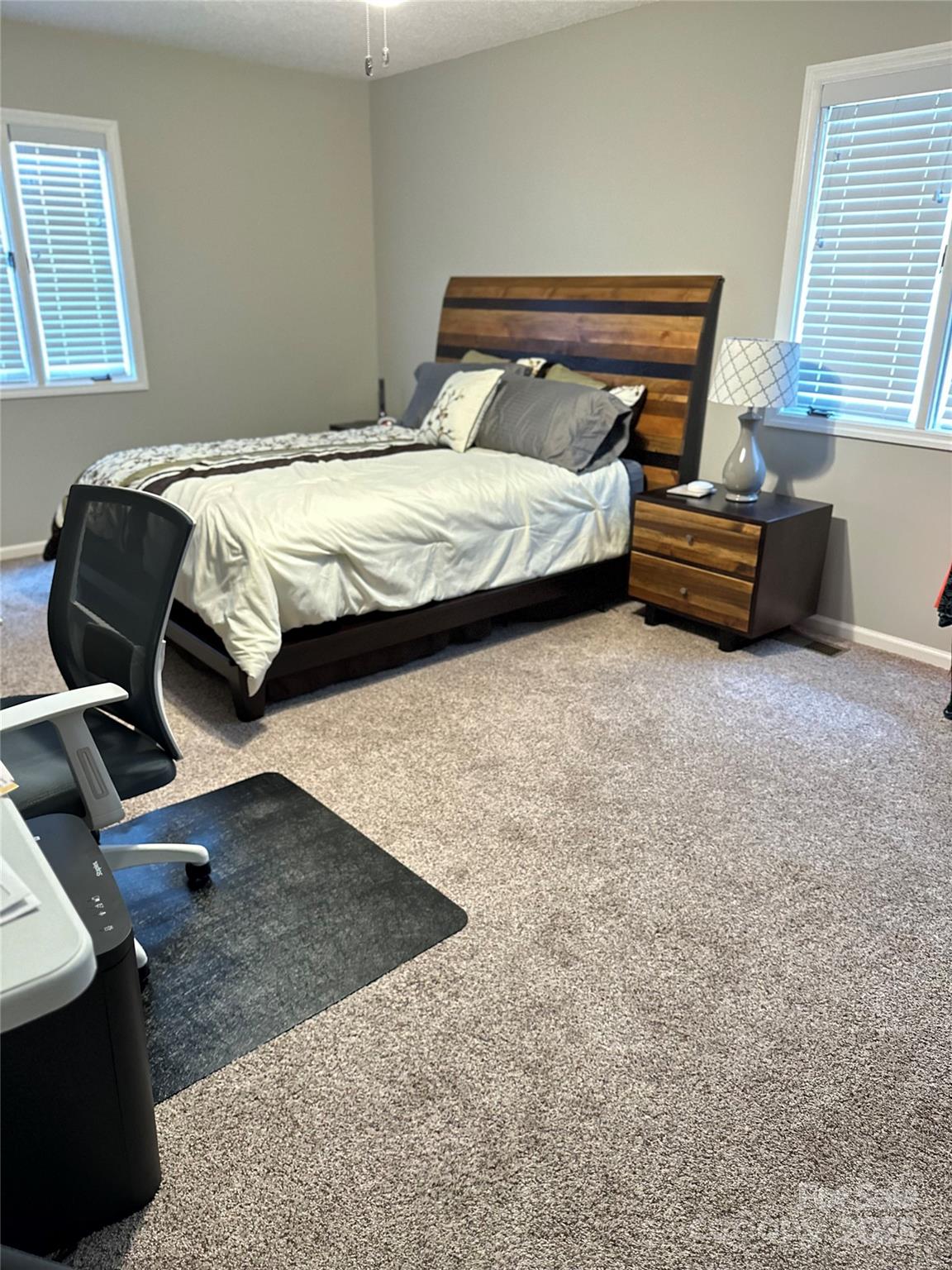 450 Case Cove Road, Unit 85 Candler, NC 28715 - Photo 8 of 14 a bedroom with a bed and window