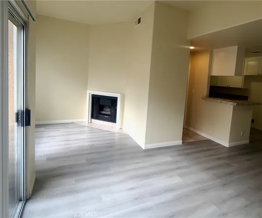 a view of a kitchen from the hallway