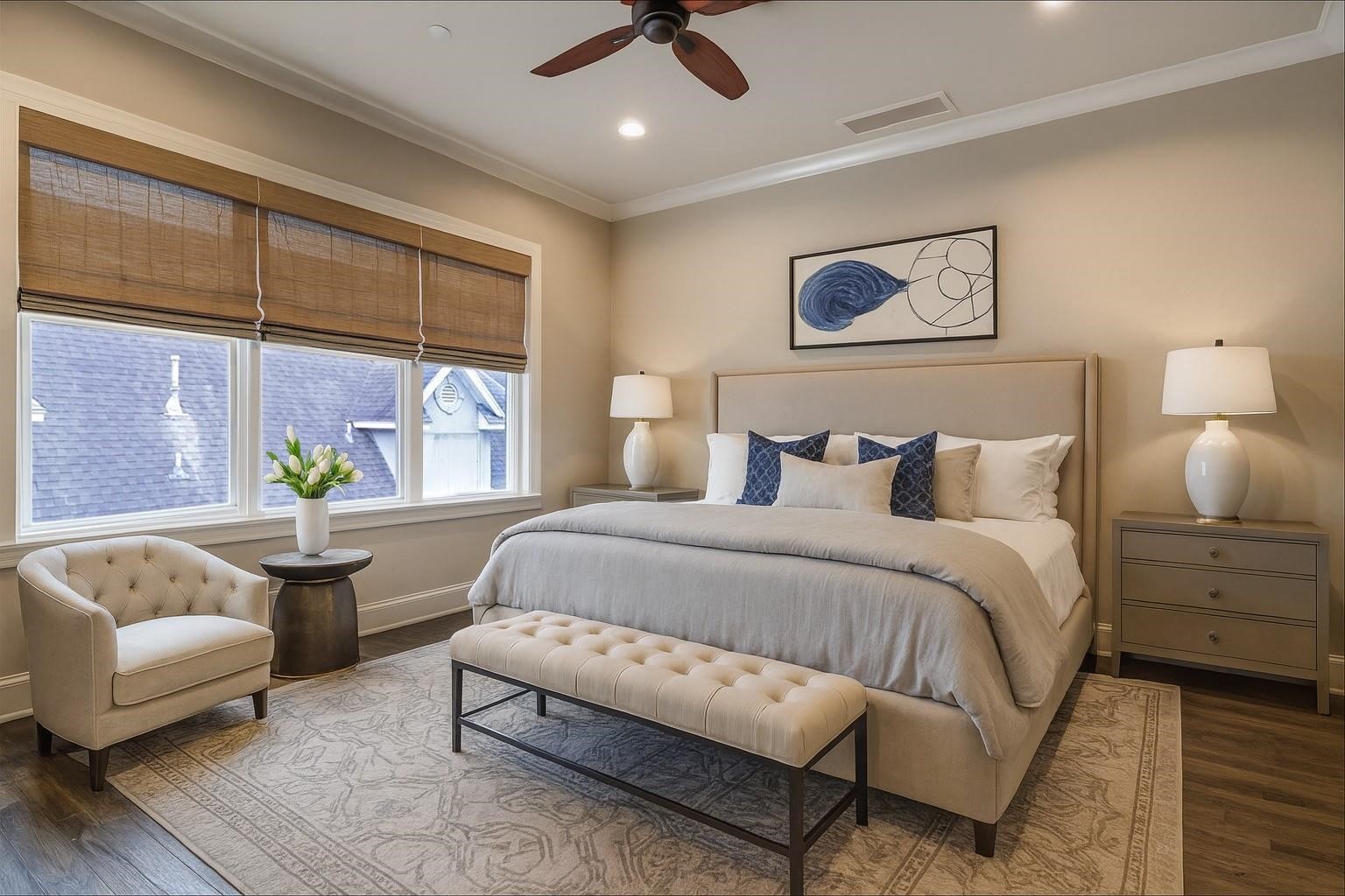 5218 Crawford Street Houston, TX 77004 - Photo 7 of 22 The primary bedroom is located on the third floor. Wood floors, ceiling fan, and 2 customized walk-in closets. The utility room with full size washer/dryer is also conveniently located on the third floor. Virtually Staged
