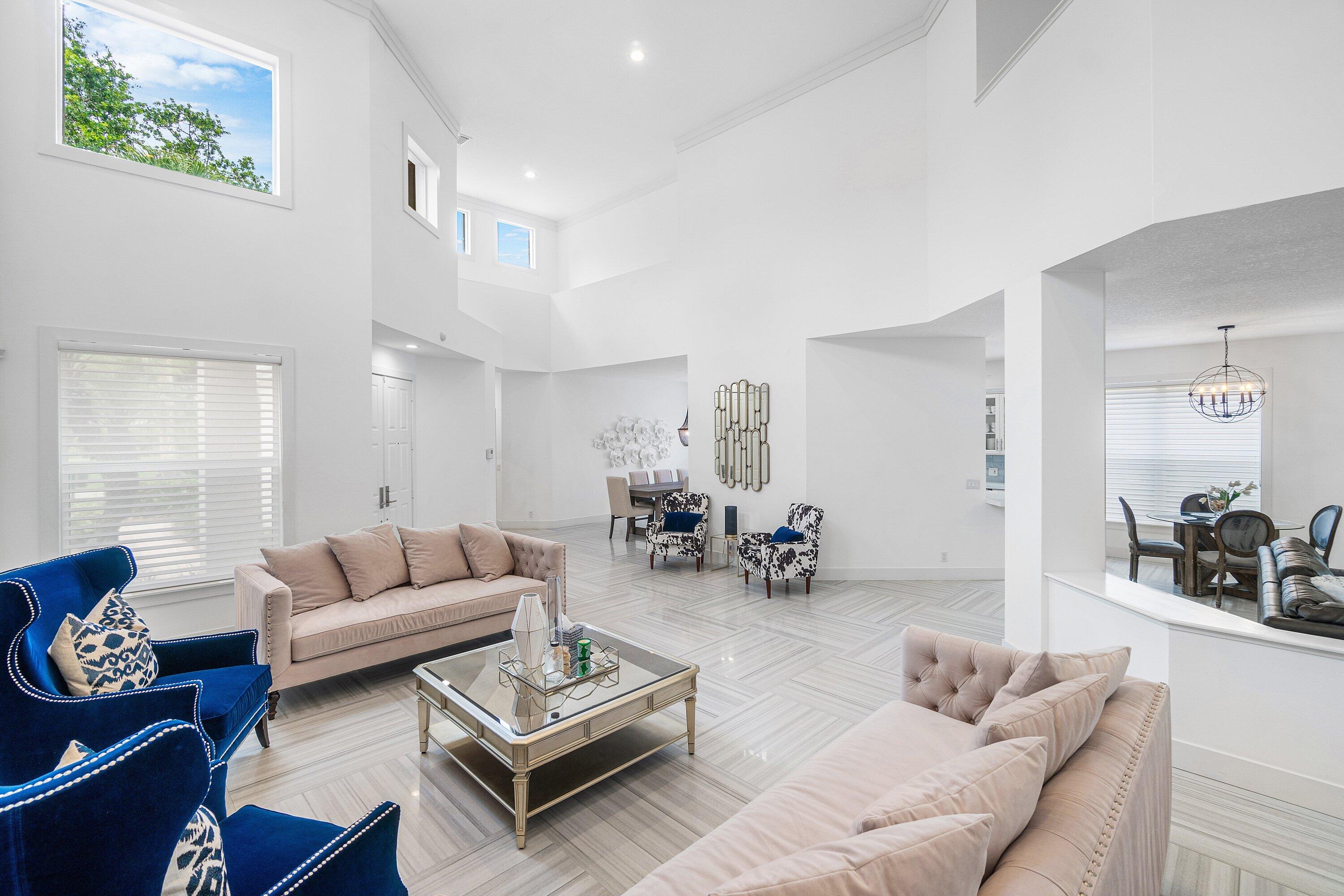 2404 Northwest 67th Street Boca Raton, FL 33496 - Photo 5 of 74 a living room with furniture or couch and a window