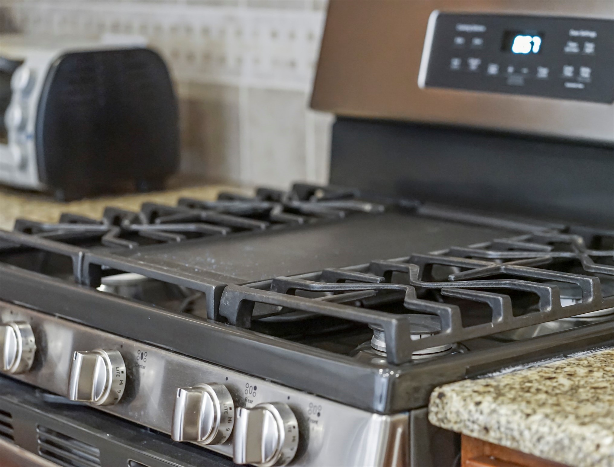 8214 Garrison Point Drive Houston, TX 77040 - Photo 27 of 37 a close view of stove top oven
