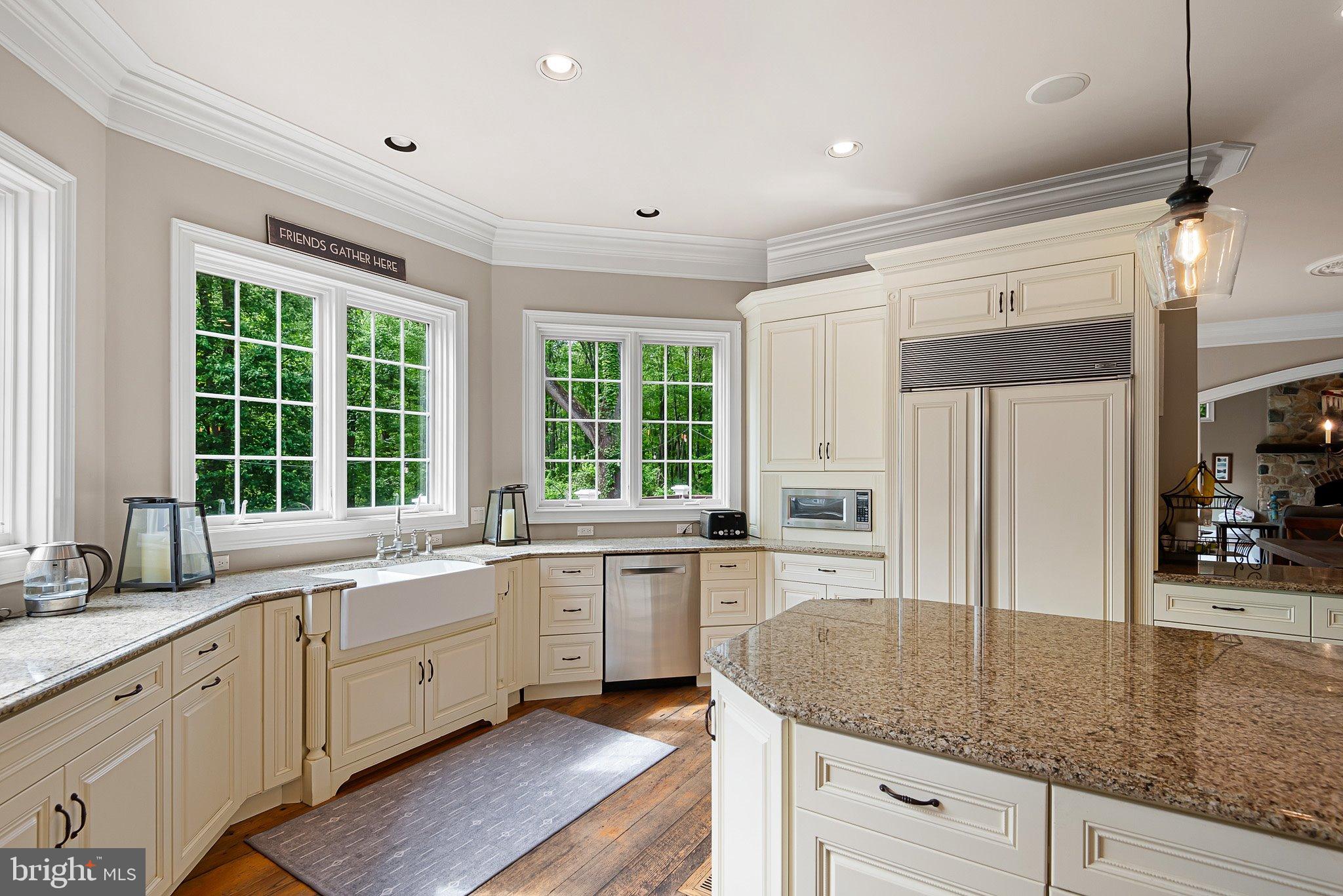 104 Timber Ridge Lane Chadds Ford, PA 19317 - Photo 22 of 65 a kitchen with sink stove and refrigerator