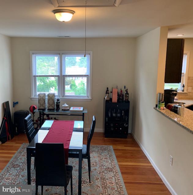95 Linden Avenue, Unit B Pitman, NJ 08071 - Photo 10 of 15 a view of a dining room with furniture