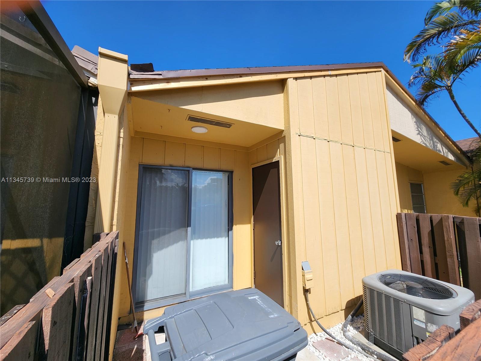 11603 Timbers Way Boca Raton, FL 33428 - Photo 39 of 48 a view of front door of house