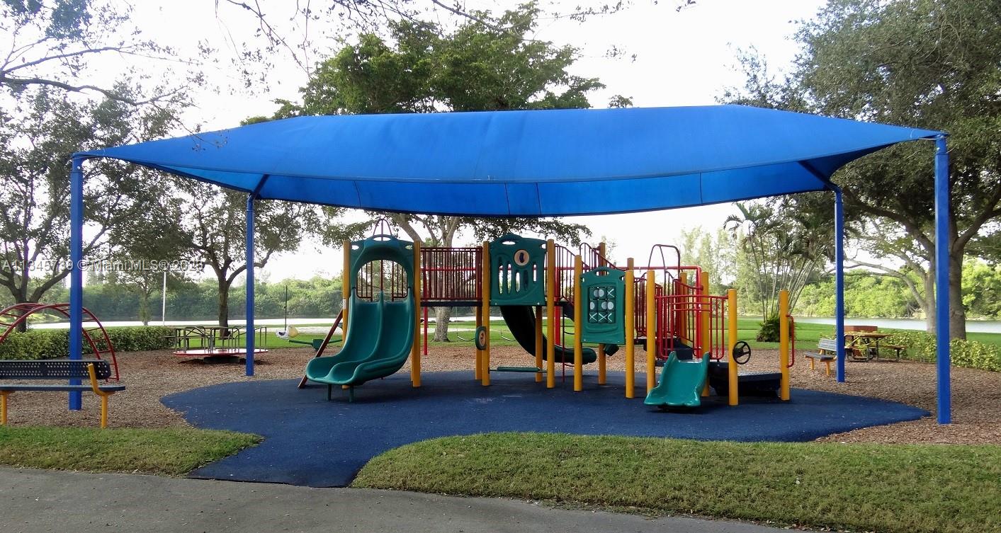 11603 Timbers Way Boca Raton, FL 33428 - Photo 46 of 48 a view of a park with slide