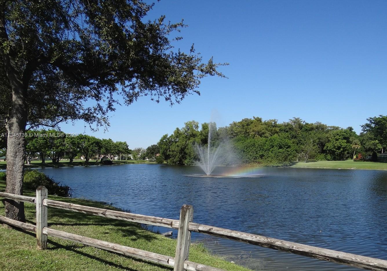 11603 Timbers Way Boca Raton, FL 33428 - Photo 48 of 48 a view of a lake with houses in the back