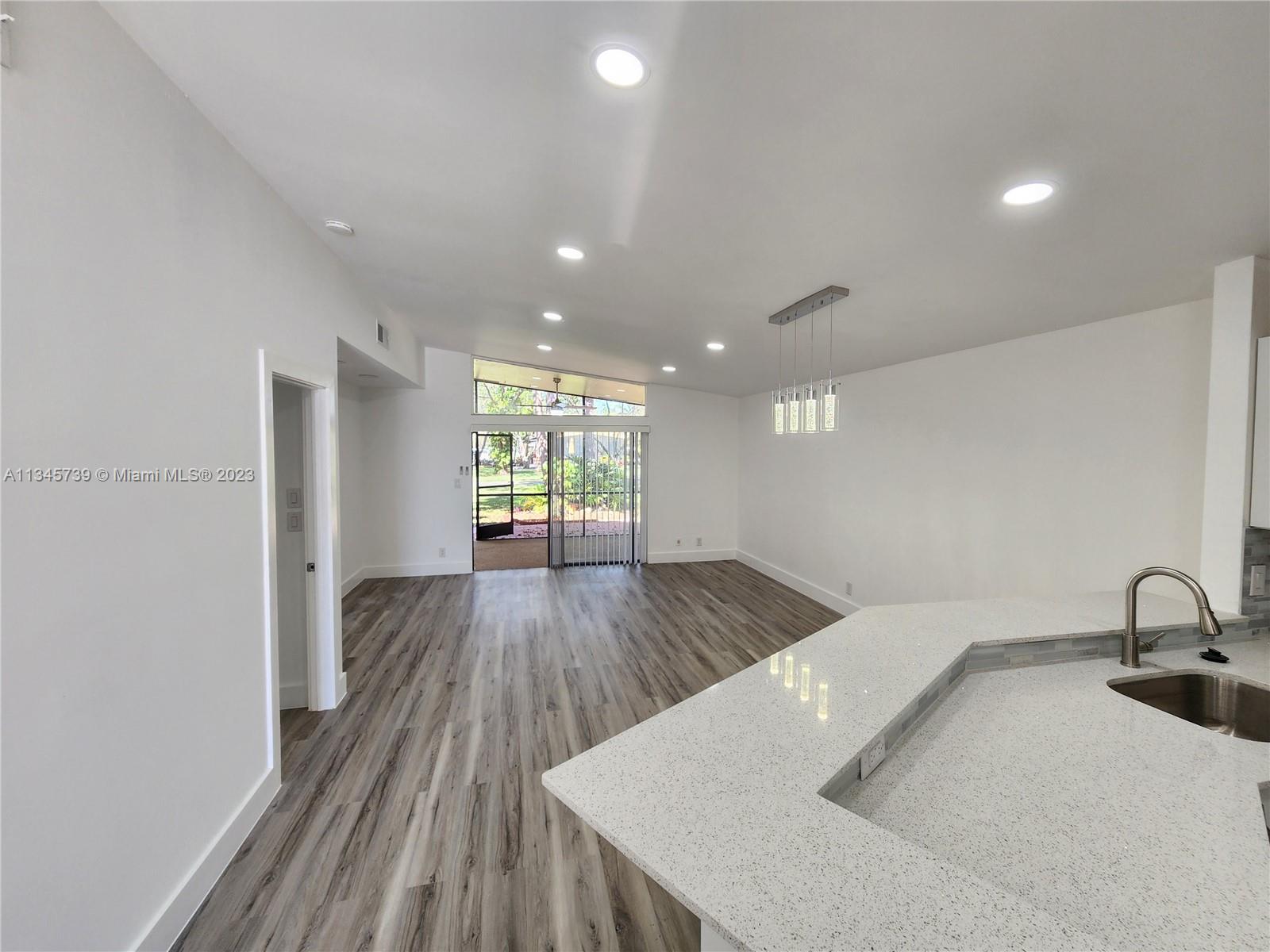 11603 Timbers Way Boca Raton, FL 33428 - Photo 6 of 48 a kitchen with sink and window