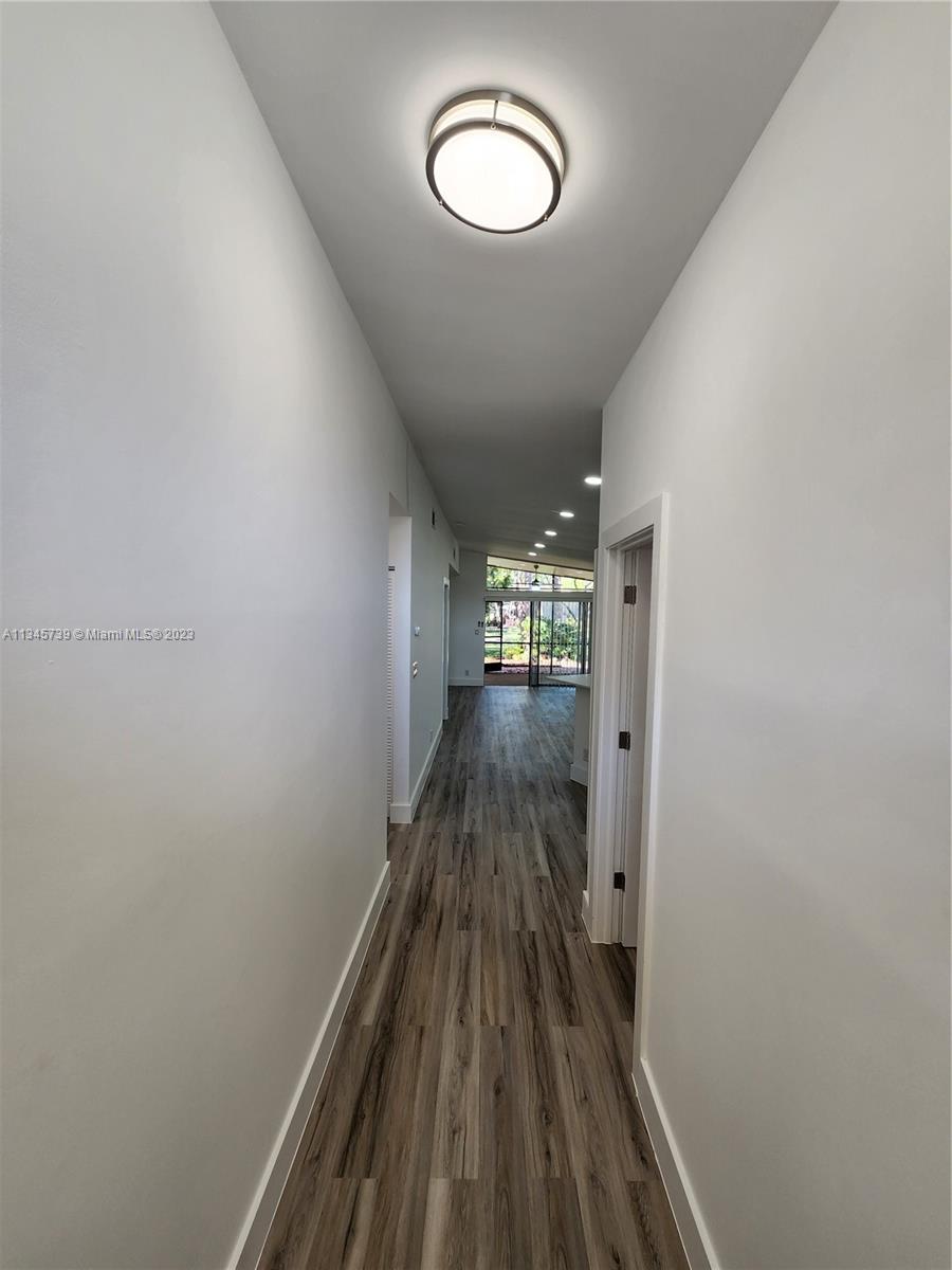 11603 Timbers Way Boca Raton, FL 33428 - Photo 8 of 48 a view of a room with wooden floor