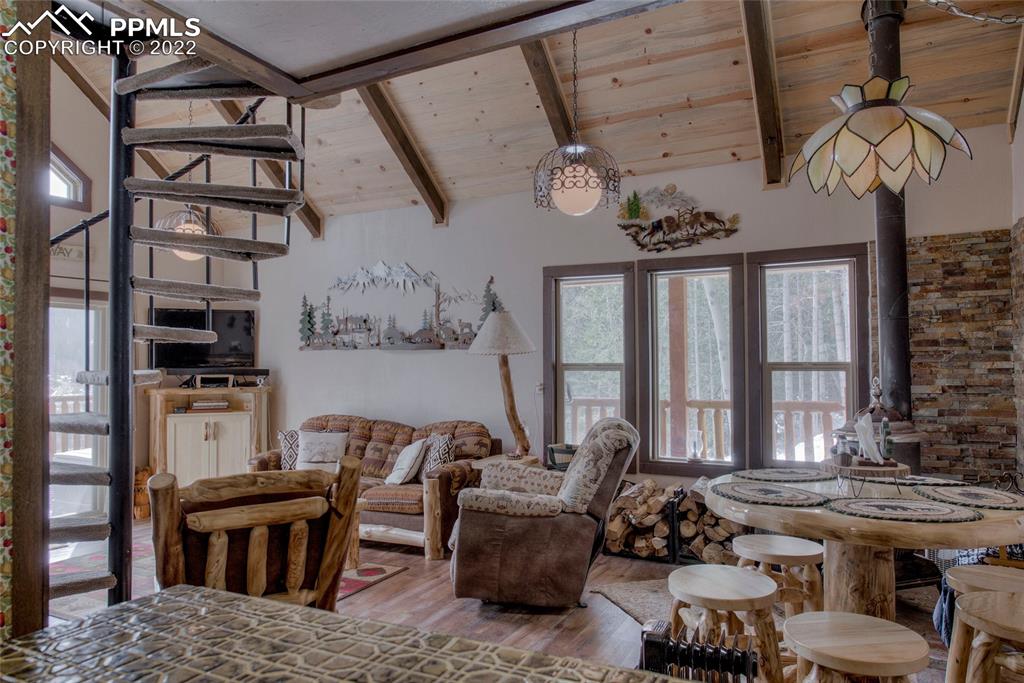 176 Cheyenne Road Alma, CO 80420 - Photo 14 of 50 a living room with furniture a chandelier and a window