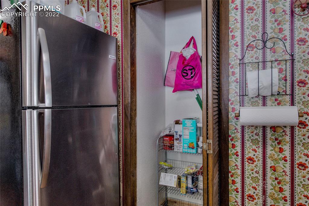 176 Cheyenne Road Alma, CO 80420 - Photo 18 of 50 a utility room with lots of clutter and cabinets