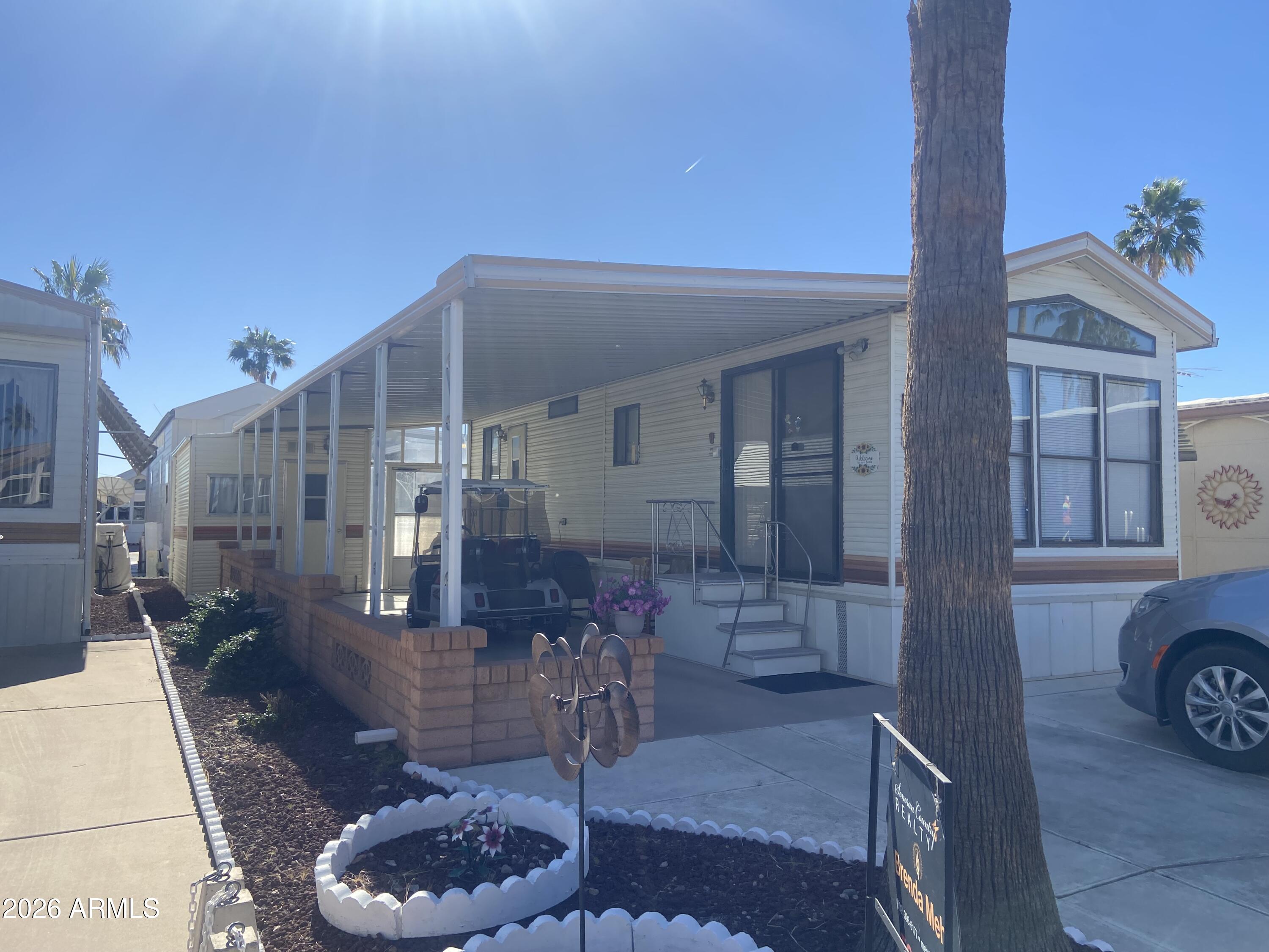 1328 West Inuit Avenue Apache Junction, AZ 85119 - Photo 16 of 45 a view of a entryway of the house