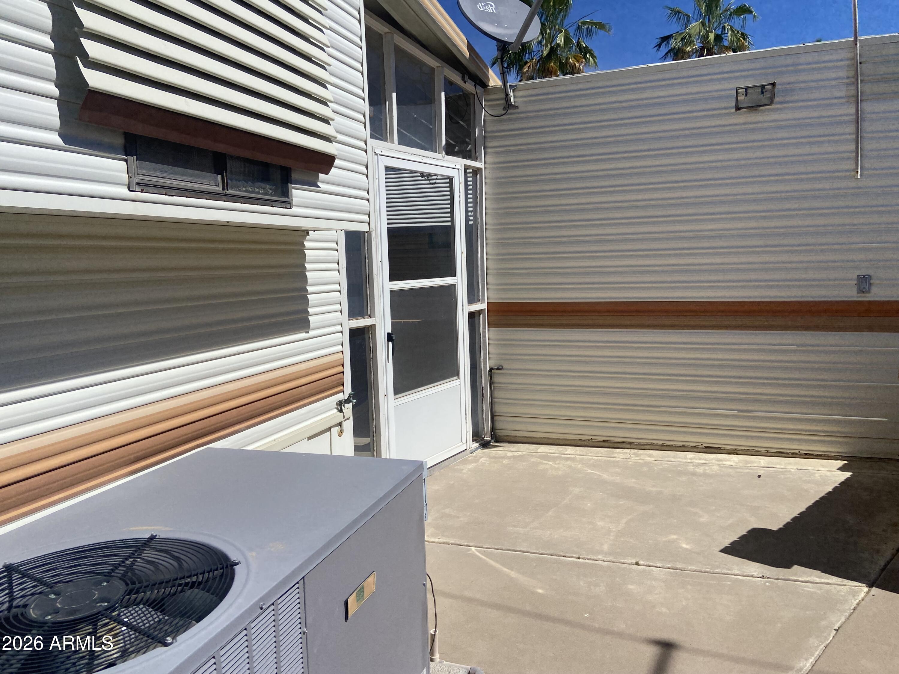 1328 West Inuit Avenue Apache Junction, AZ 85119 - Photo 27 of 45 a view of a house with a garage