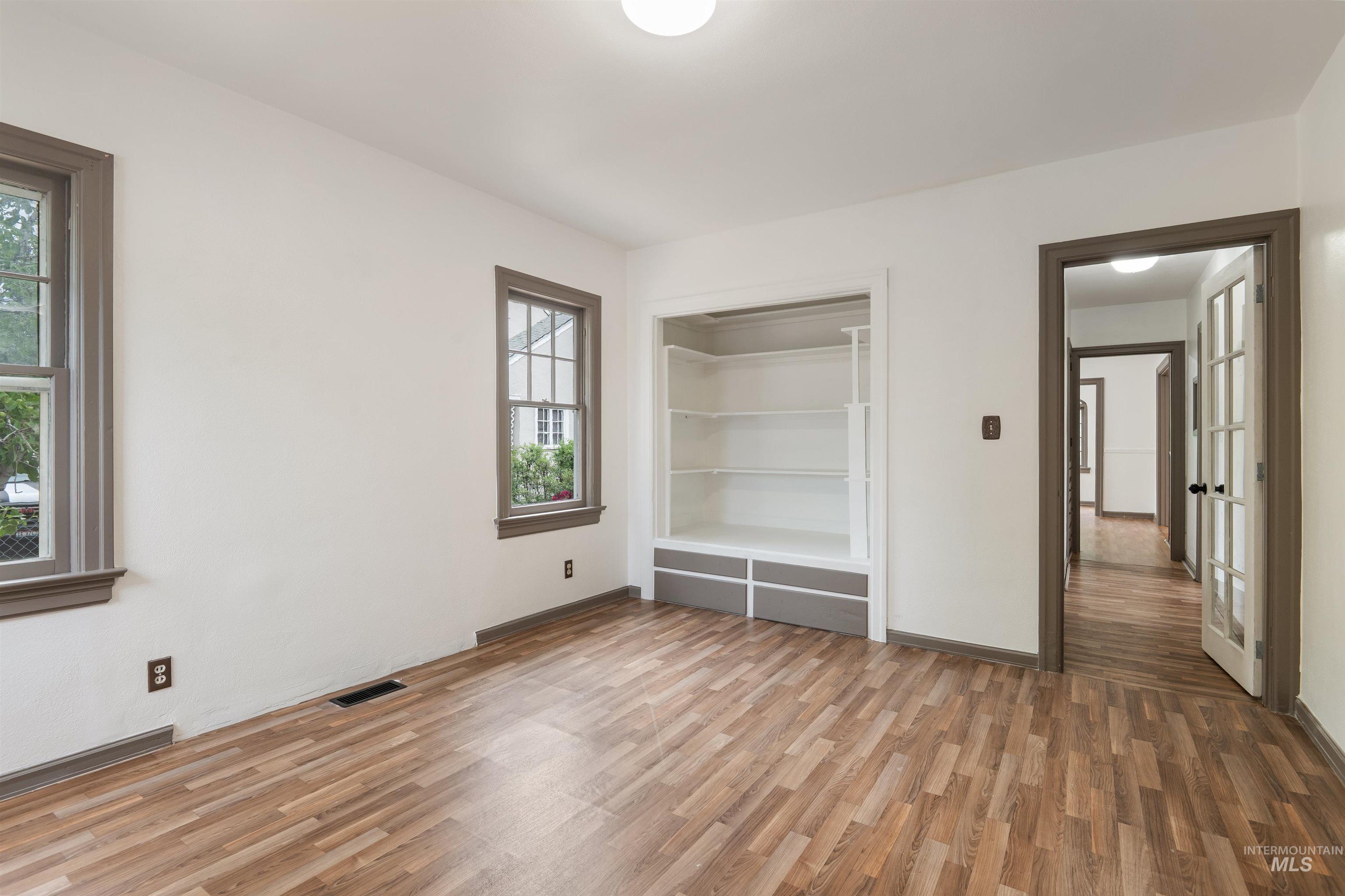 191 Southwest 5th Avenue Ontario, OR 97914 - Photo 17 of 50 Unfurnished bedroom featuring light wood-style flooring and a closet
