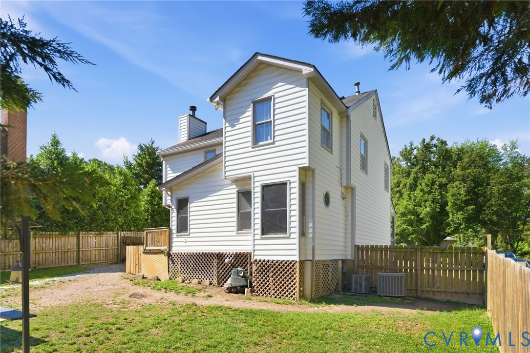 9110 Gayton Road Henrico, VA 23229 - Photo 42 of 54 a front view of a house with a yard