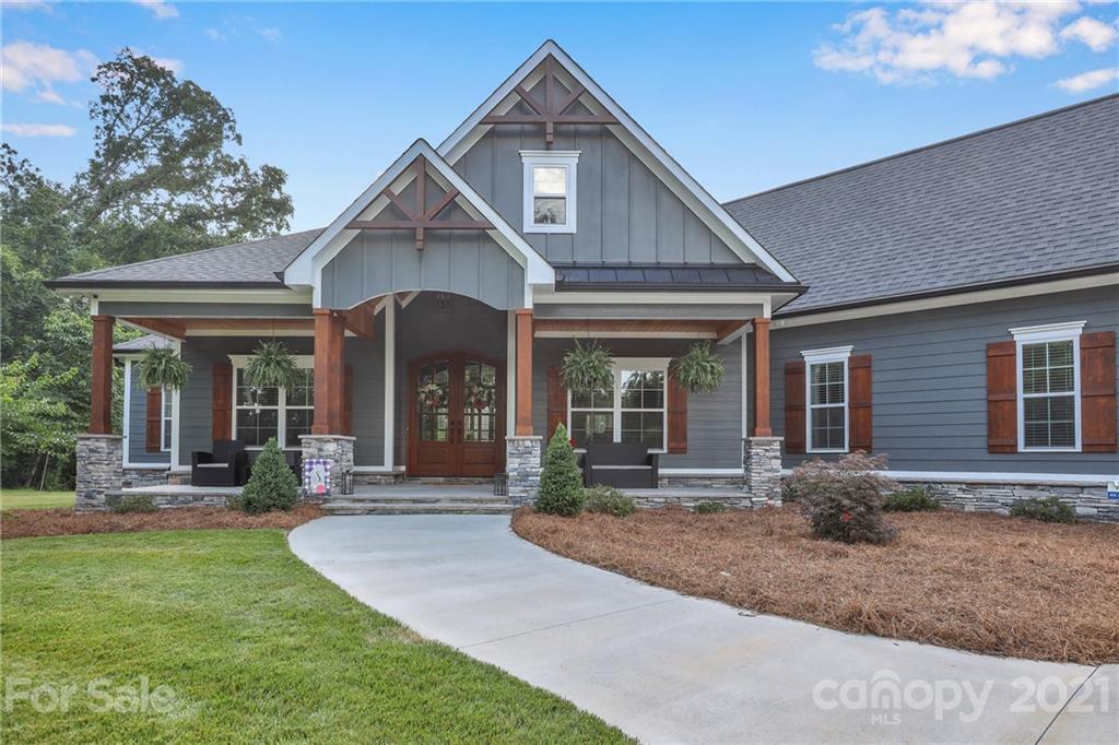 120 Agner Road Salisbury, NC 28146 - Photo 2 of 48 a front view of a house with garden and porch