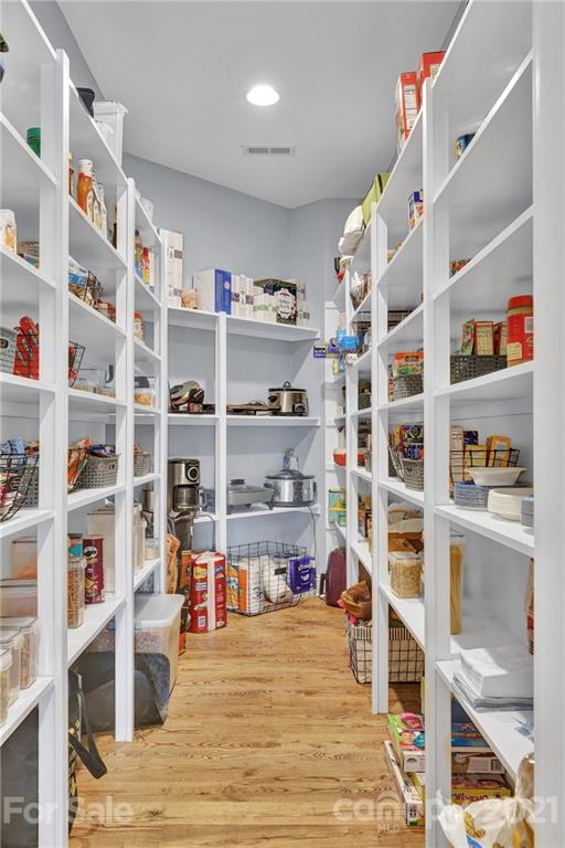 120 Agner Road Salisbury, NC 28146 - Photo 23 of 48 a room with shelves on the wall and shelf