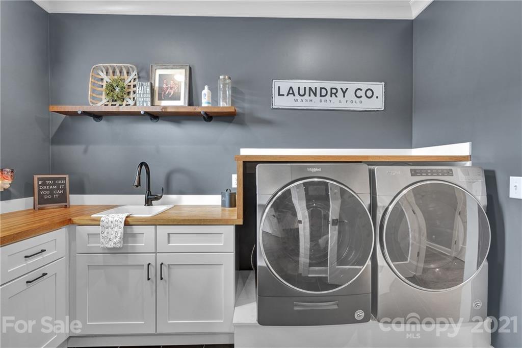 120 Agner Road Salisbury, NC 28146 - Photo 25 of 48 a view of a kitchen with washing machine
