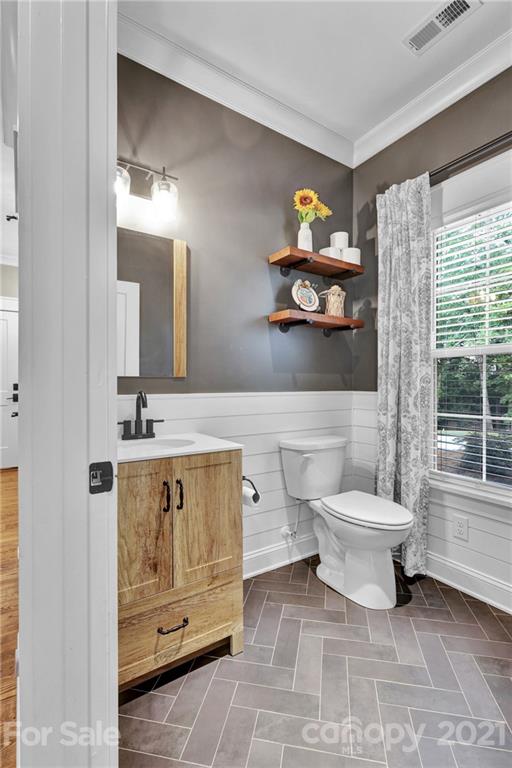 120 Agner Road Salisbury, NC 28146 - Photo 26 of 48 a bathroom with a toilet sink and mirror