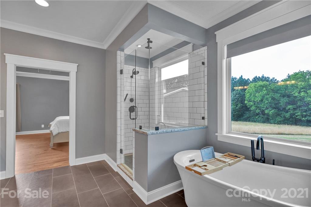 120 Agner Road Salisbury, NC 28146 - Photo 31 of 48 a bath room with a bath tub and a shower