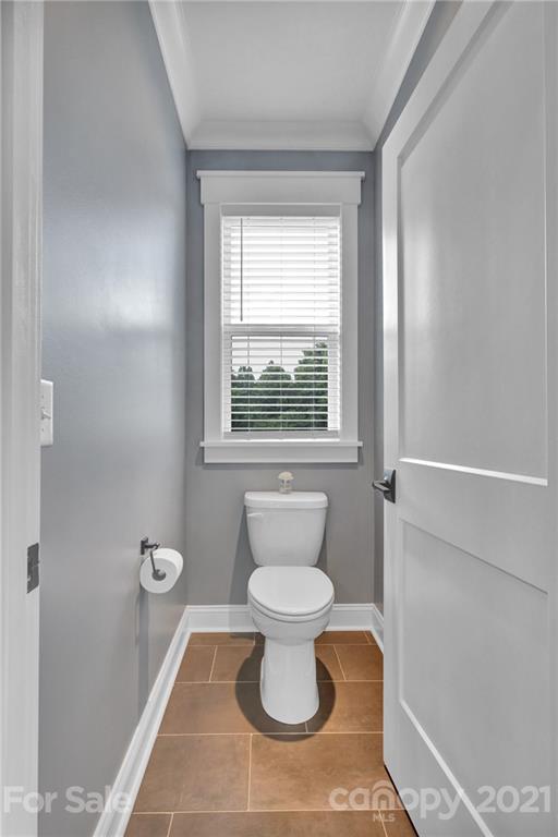 120 Agner Road Salisbury, NC 28146 - Photo 33 of 48 a bathroom with a toilet and a window