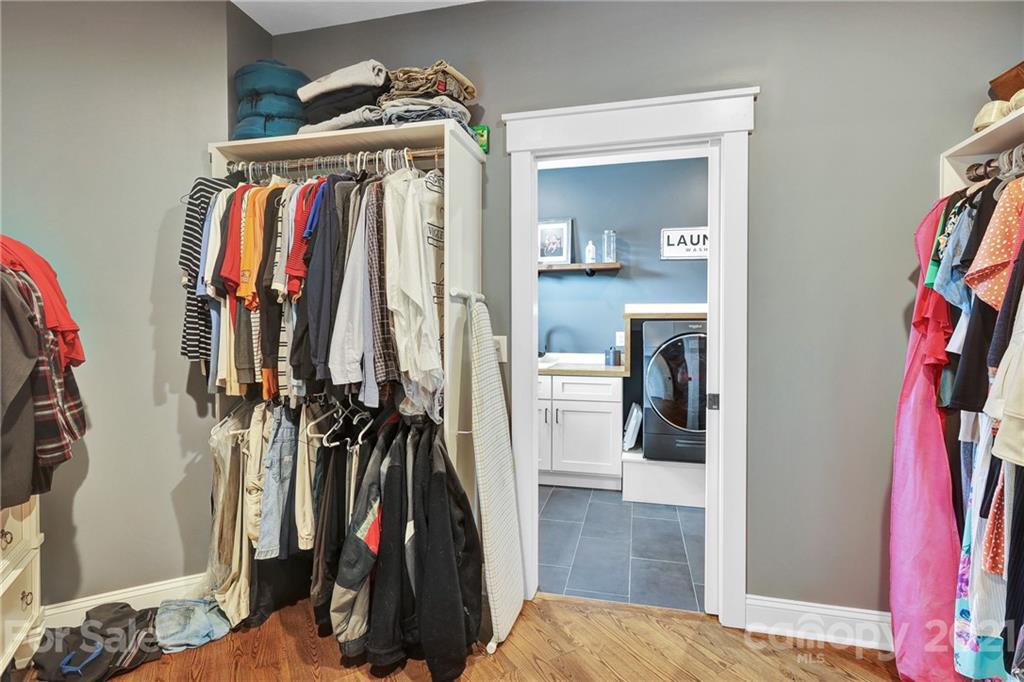 120 Agner Road Salisbury, NC 28146 - Photo 35 of 48 a view of walk in closet with clothes and shoes