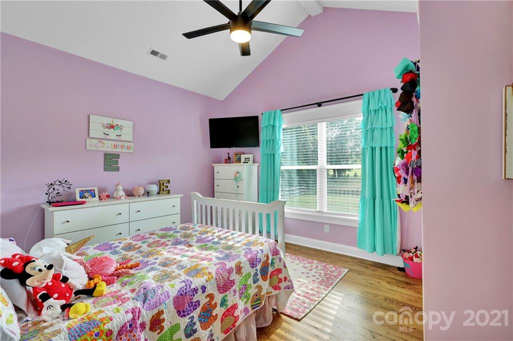 120 Agner Road Salisbury, NC 28146 - Photo 36 of 48 a bedroom with a bed and a tv