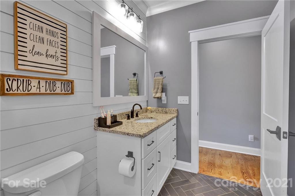 120 Agner Road Salisbury, NC 28146 - Photo 39 of 48 a bathroom with a granite countertop sink toilet and shower