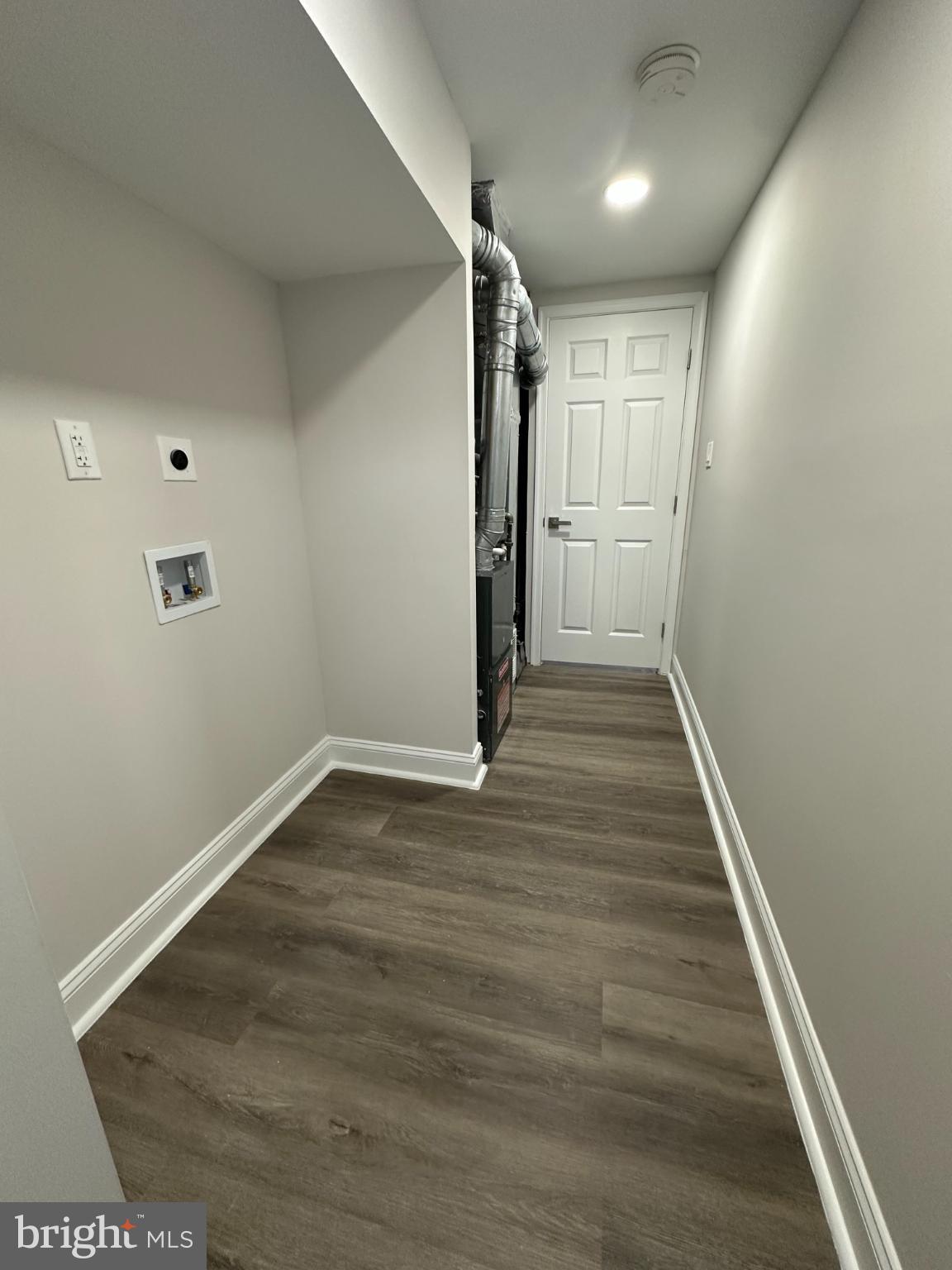 1742 Lyman Place Northeast Washington, DC 20002 - Photo 28 of 30 a view of hallway with wooden floor