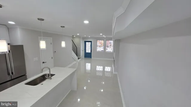 a view of a hallway with windows