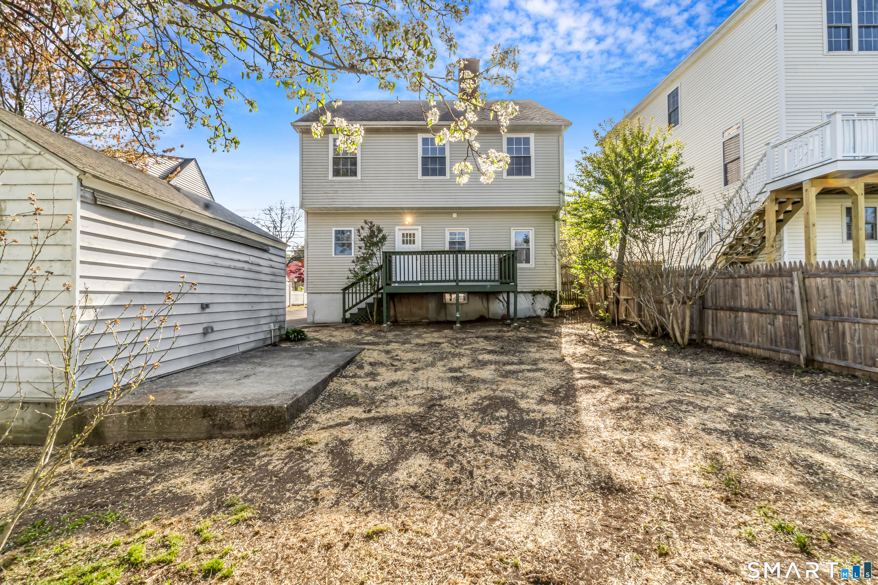 1770 Stratfield Road Fairfield, CT 06825 - Photo 36 of 40 a view of a house with a yard