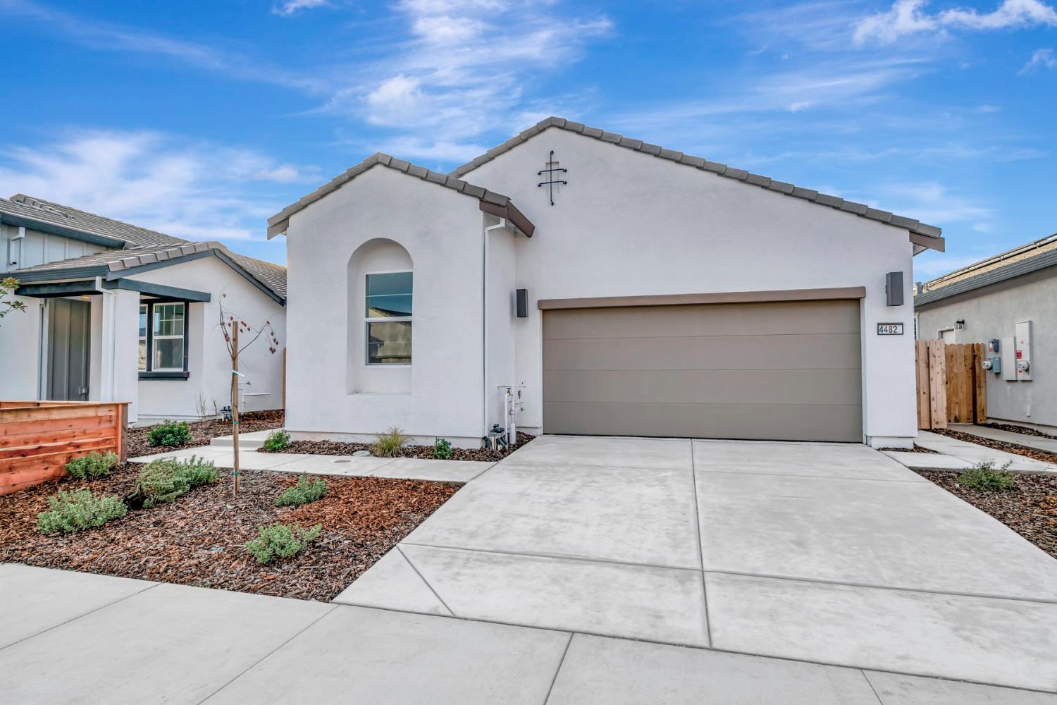 4482 Doric Way Rancho Cordova, CA 95742 - Photo 1 of 1 a front view of a house with garden