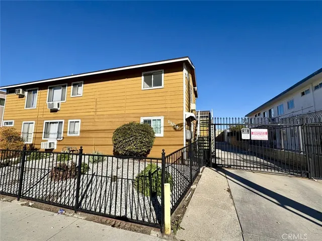 a view of a balcony with wooden floor