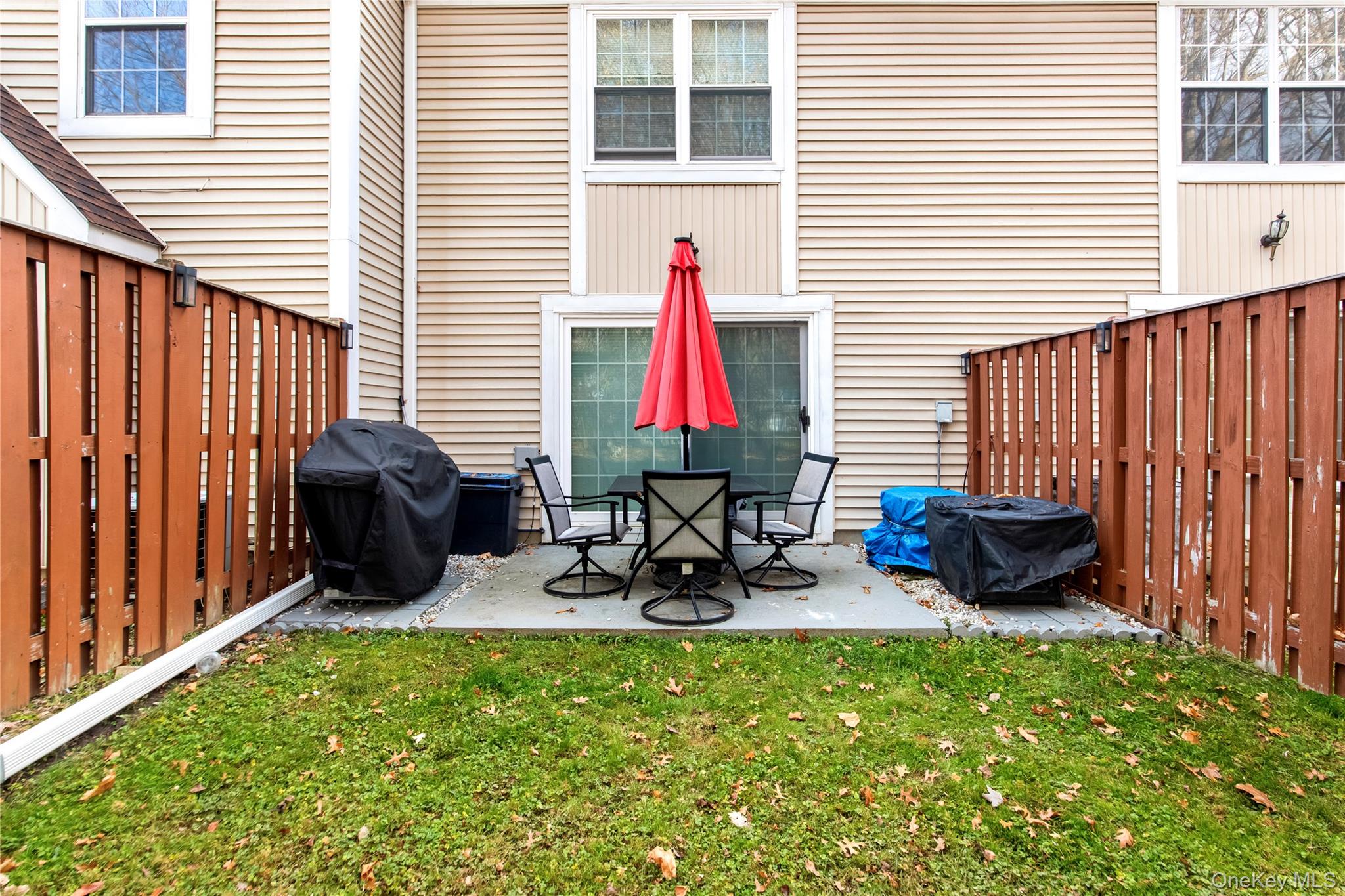 79 Creekside Circle Spring Valley, NY 10977 - Photo 12 of 13 a view of a two chairs in the patio