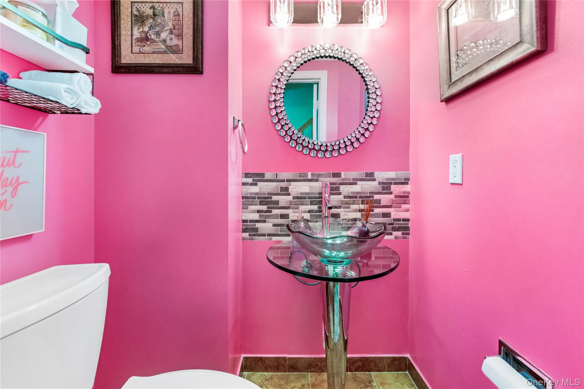79 Creekside Circle Spring Valley, NY 10977 - Photo 10 of 13 a bathroom with a mirror and a sink