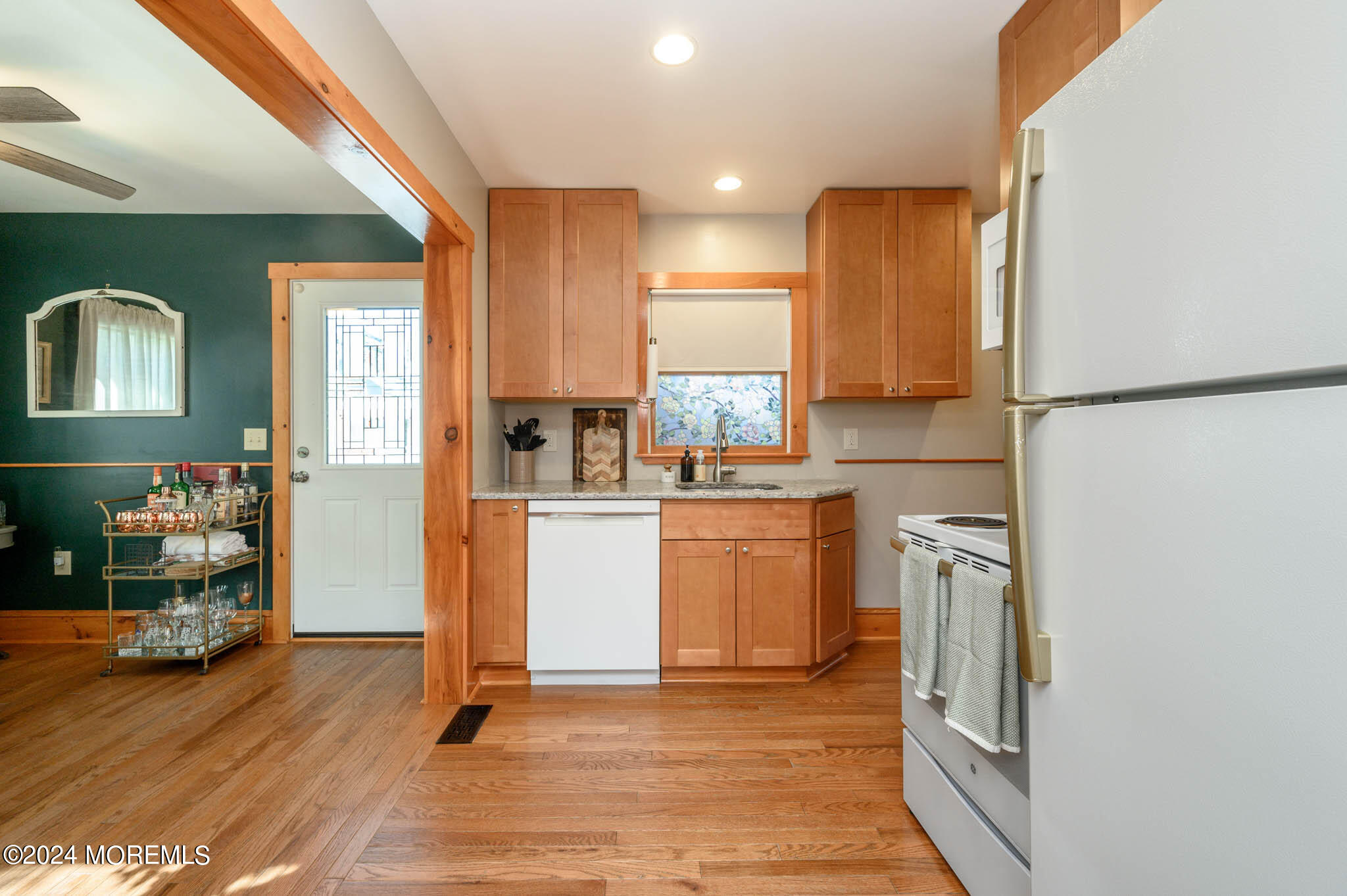 13 Oliver Street Toms River, NJ 08755 - Photo 11 of 41 a kitchen with refrigerator and cabinets