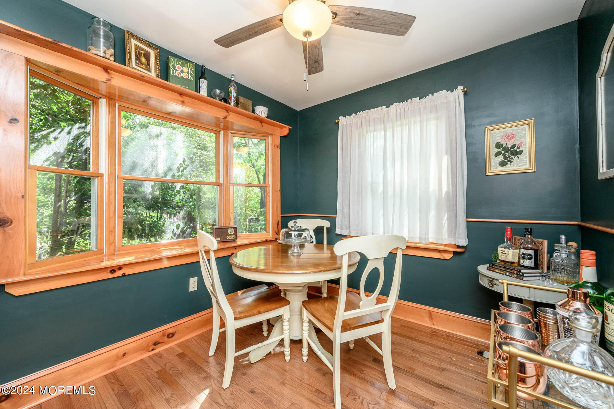 13 Oliver Street Toms River, NJ 08755 - Photo 16 of 41 a dining room with furniture a rug and wooden floor