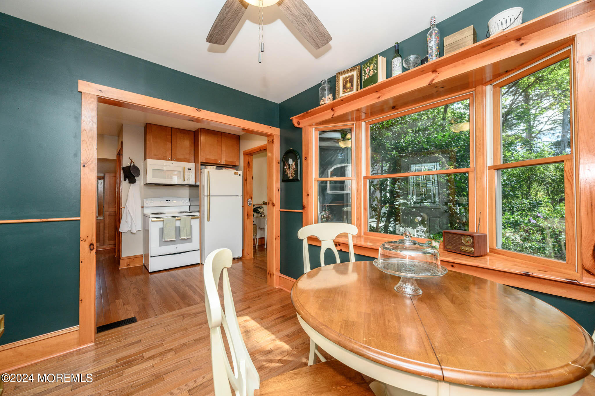 13 Oliver Street Toms River, NJ 08755 - Photo 17 of 41 a view of a dining room with furniture wooden floor and a chandelier
