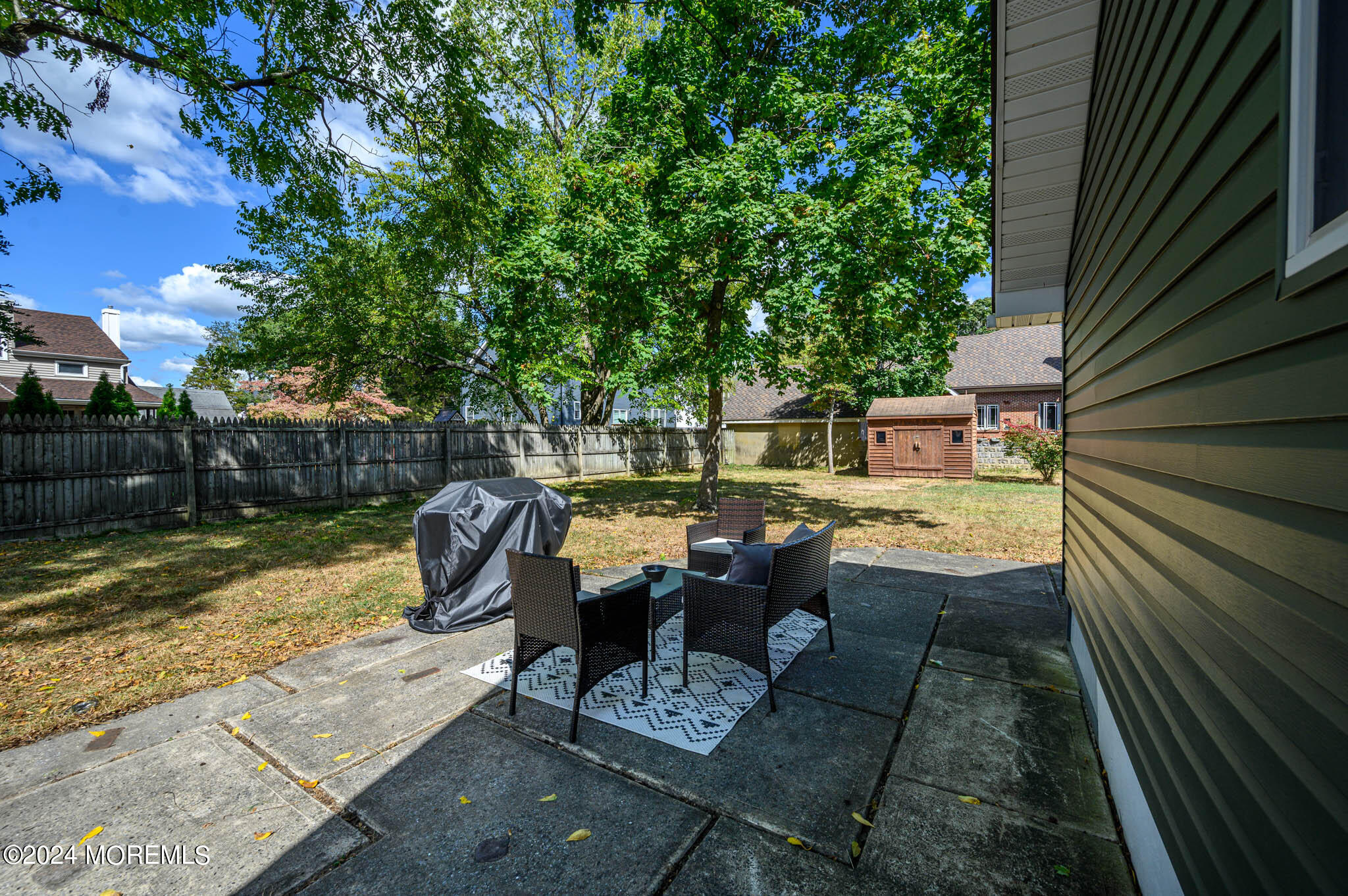 13 Oliver Street Toms River, NJ 08755 - Photo 32 of 41 a view of backyard with outdoor seating