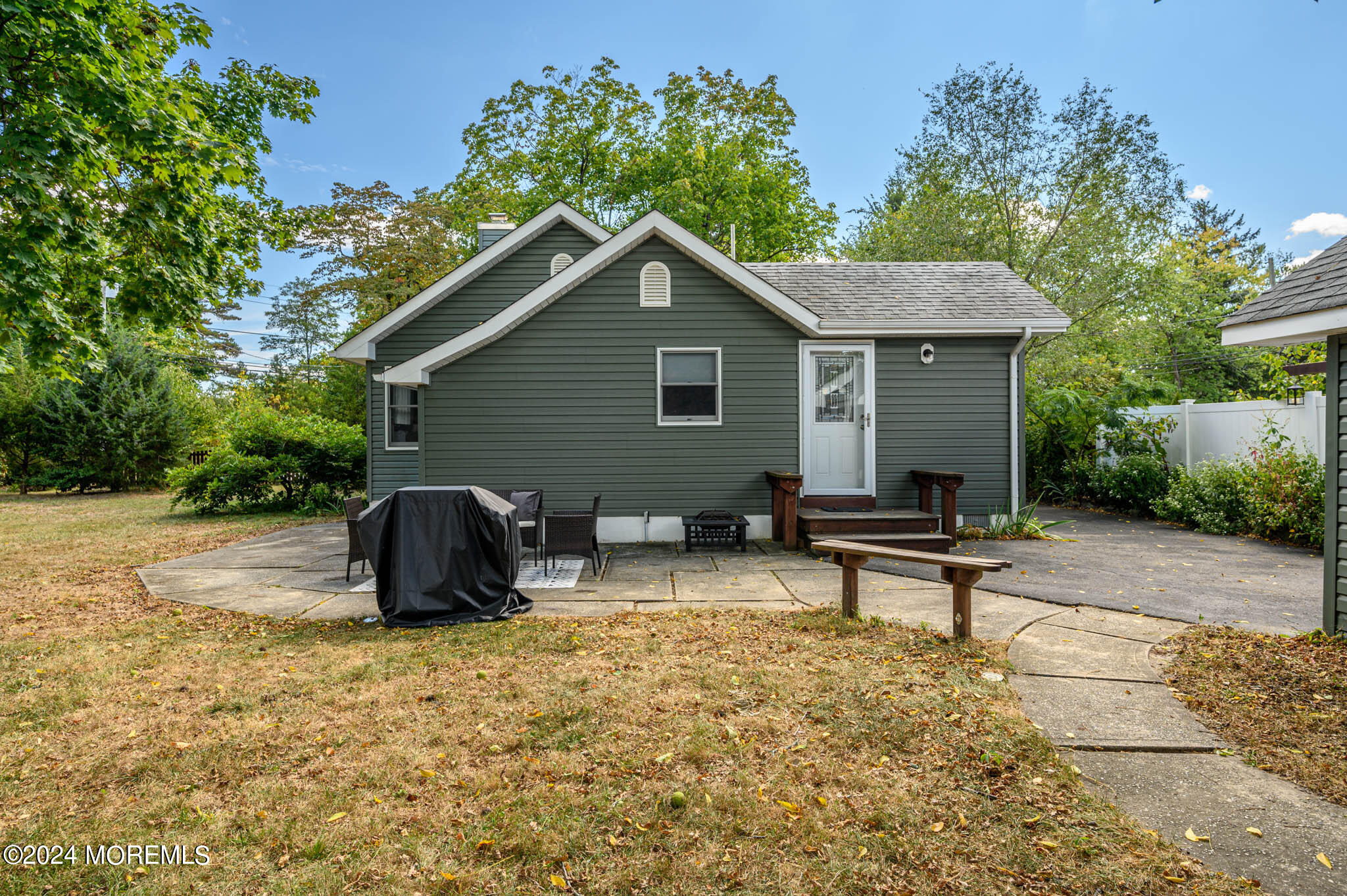 13 Oliver Street Toms River, NJ 08755 - Photo 34 of 41 a view of a house with a patio and a yard