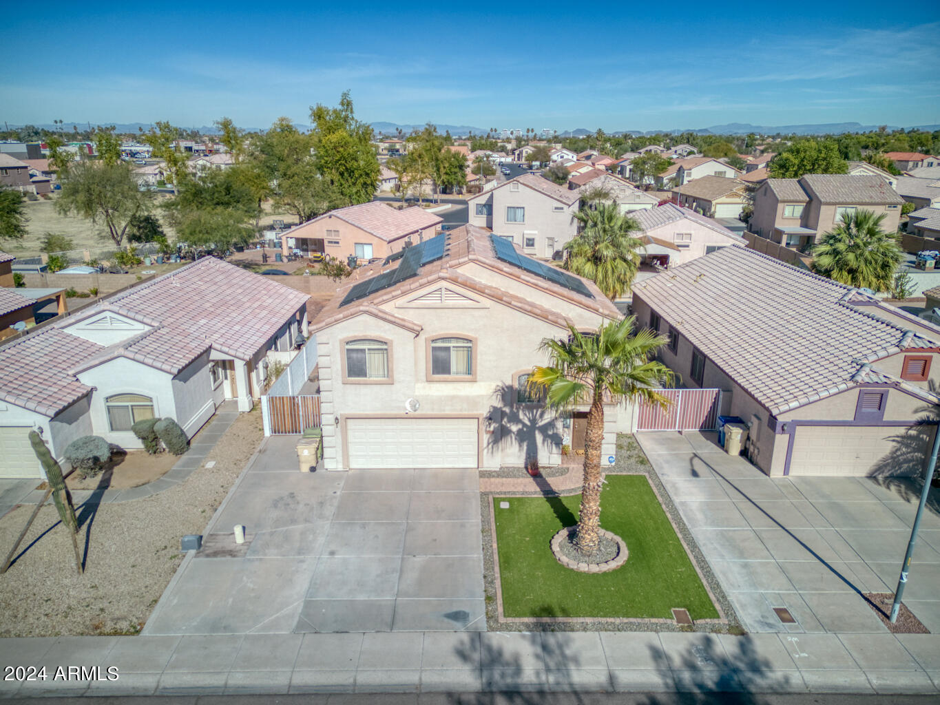 7340 West Ocotillo Road Glendale, AZ 85303 - Photo 36 of 45 an aerial view of a house with garden