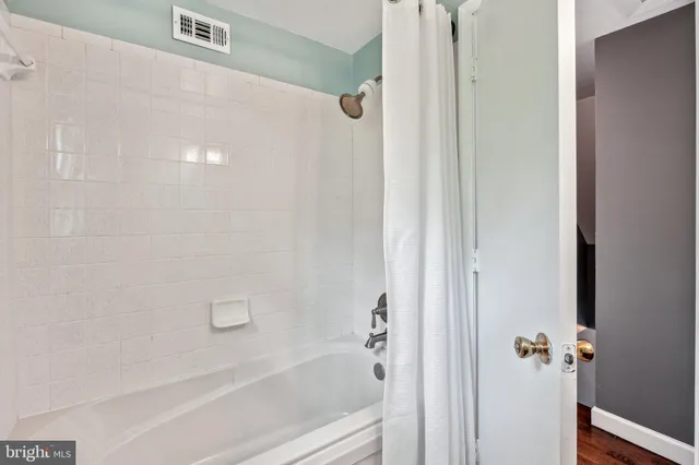 a view of a room with window and closet