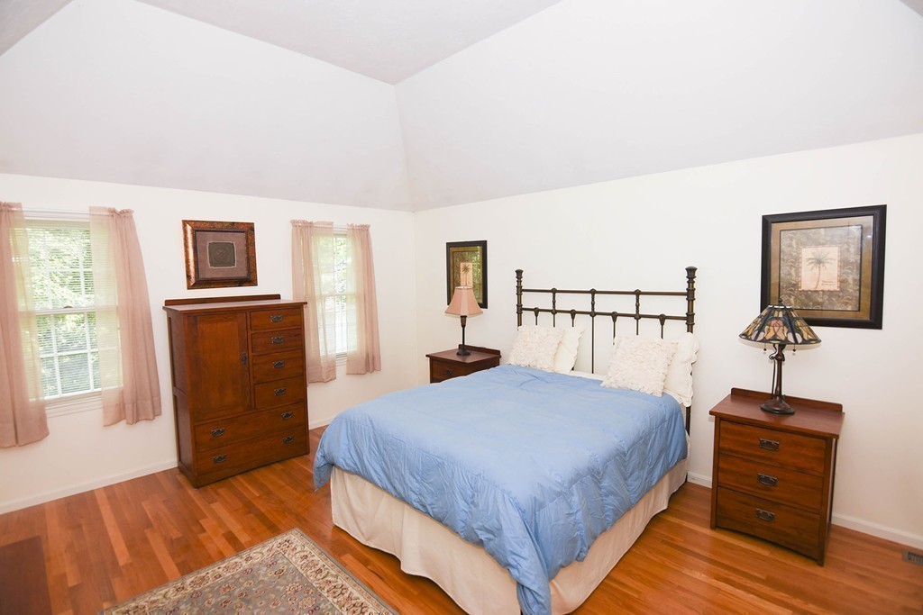 9 Nehemiah Road Shirley, MA 01464 - Photo 11 of 23 a bedroom with a bed and a dresser
