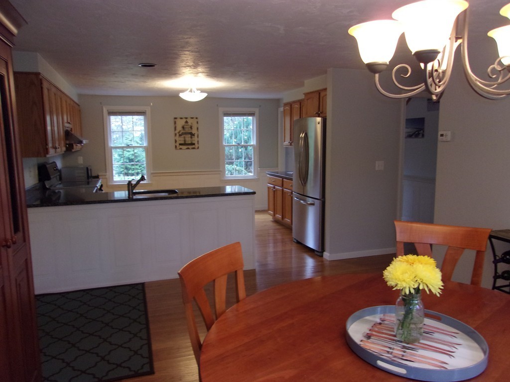 9 Nehemiah Road Shirley, MA 01464 - Photo 5 of 23 a view of a dining room with furniture