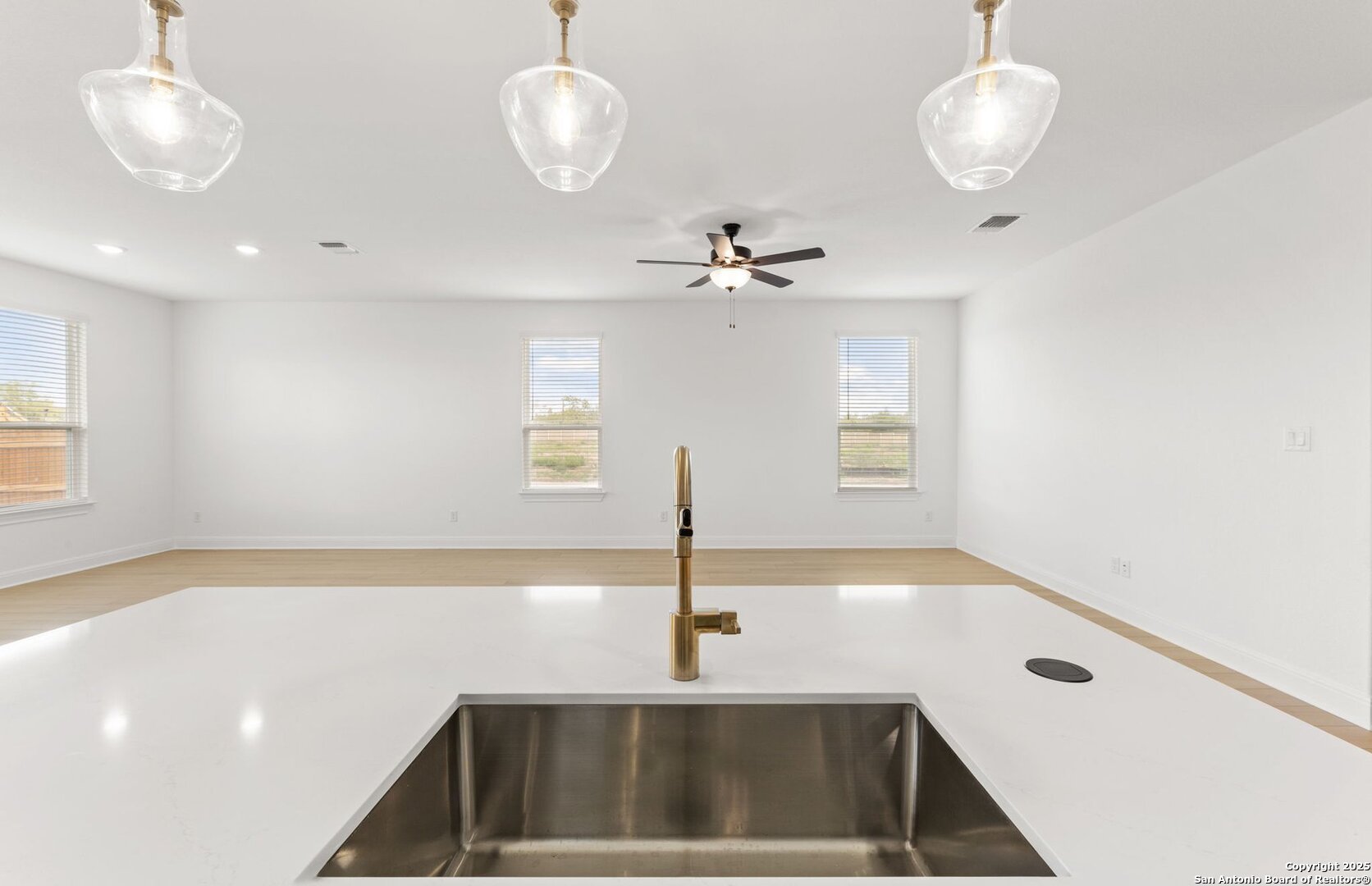 438 Nightingale Avenue Marion, TX 78124 - Photo 12 of 32 a view of a kitchen with a sink and chandelier
