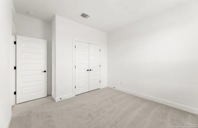 an empty room with closet