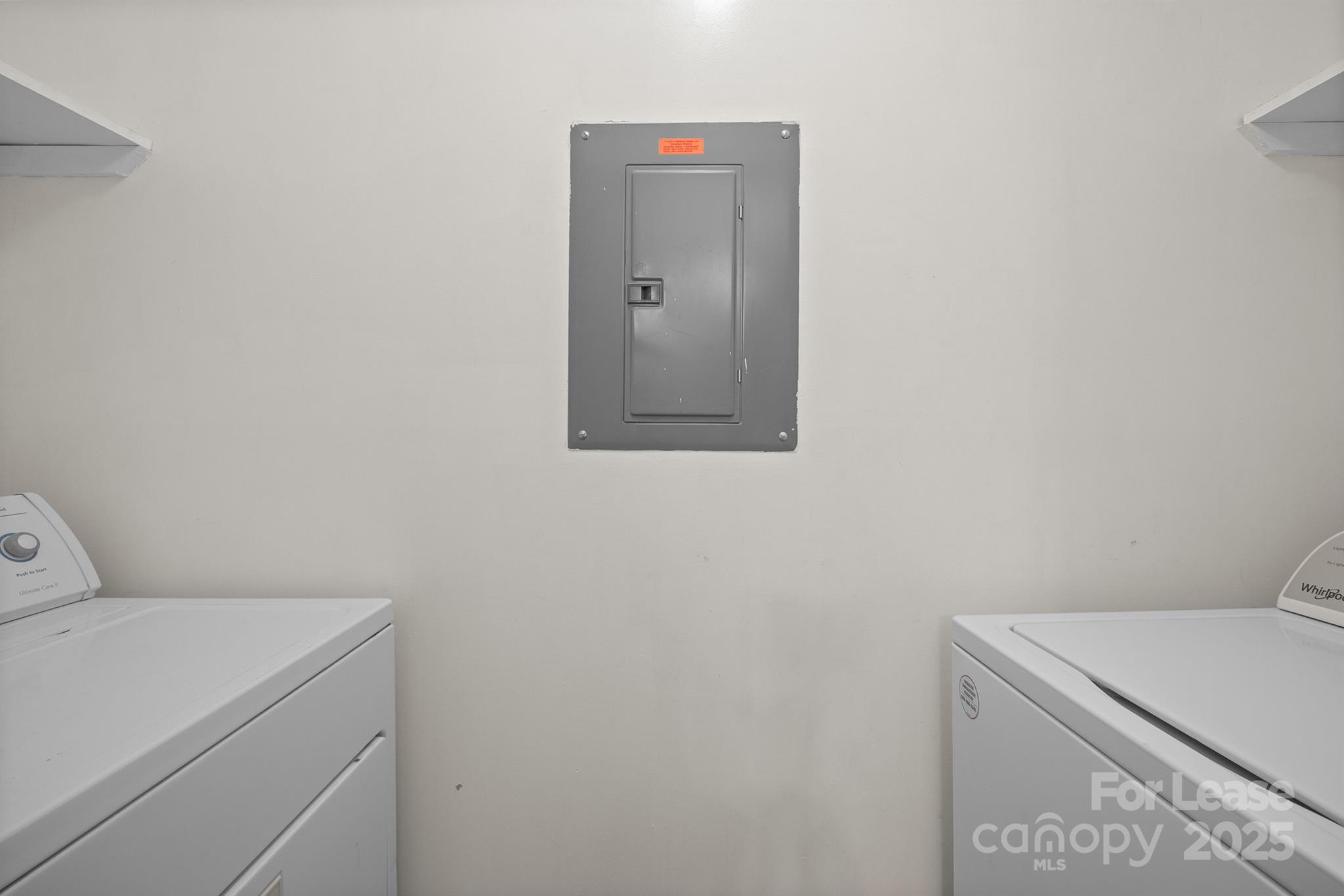 18809 Nautical Drive, Unit 202 Cornelius, NC 28031 - Photo 27 of 32 a utility room with dryer and washer