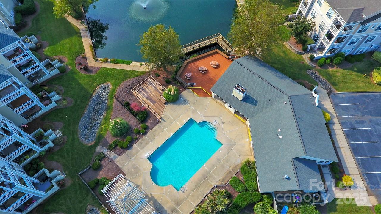 18809 Nautical Drive, Unit 202 Cornelius, NC 28031 - Photo 6 of 32 an aerial view of multiple houses with yard